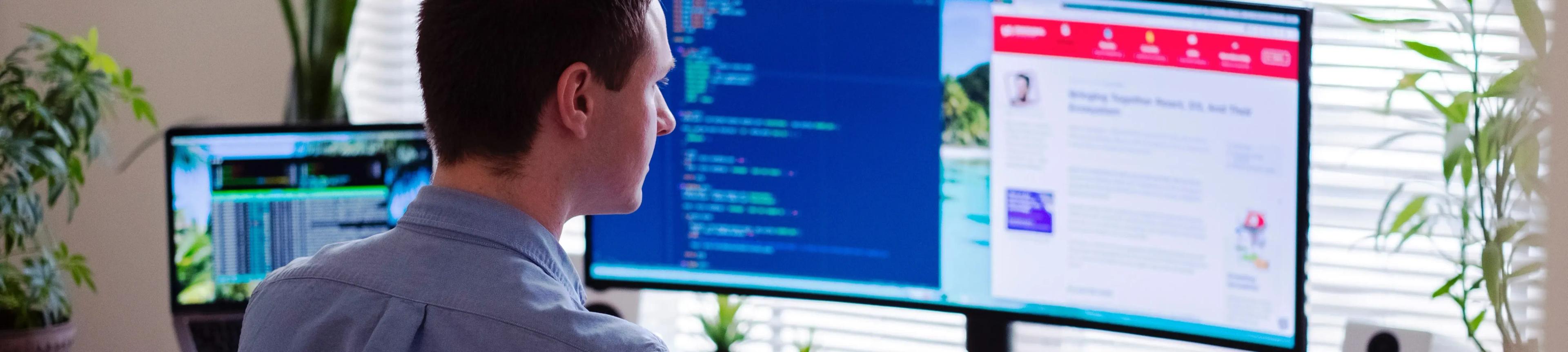 An engaged SEM manager analyzing digital data charts on a computer, showcasing the dynamic world of search engine marketing.